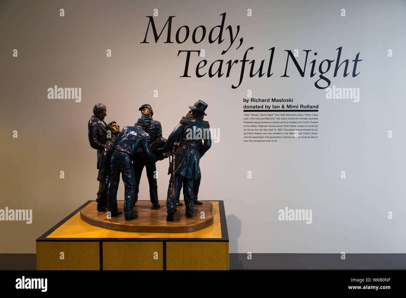 A sculpture depicting mortally wounded President Abraham Lincoln being carried from Ford's Theater is on display at the Allen County Public Library. Stock Photo