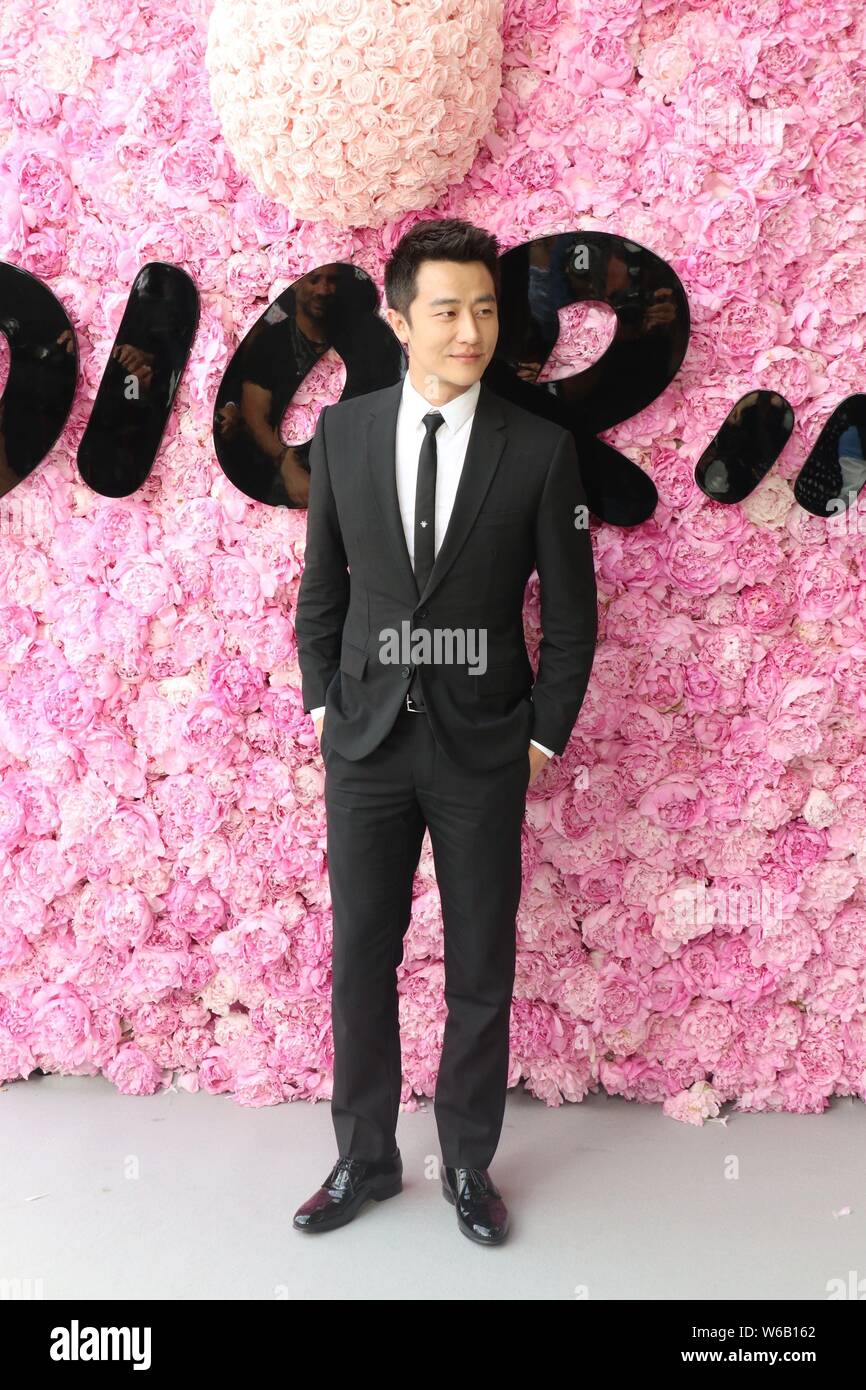Chinese actor Huang Xuan attends the fashion show of Dior Homme during the Paris Men's Fashion Week Spring/Summer 2019 in Paris, France, 23 June 2018. Stock Photo