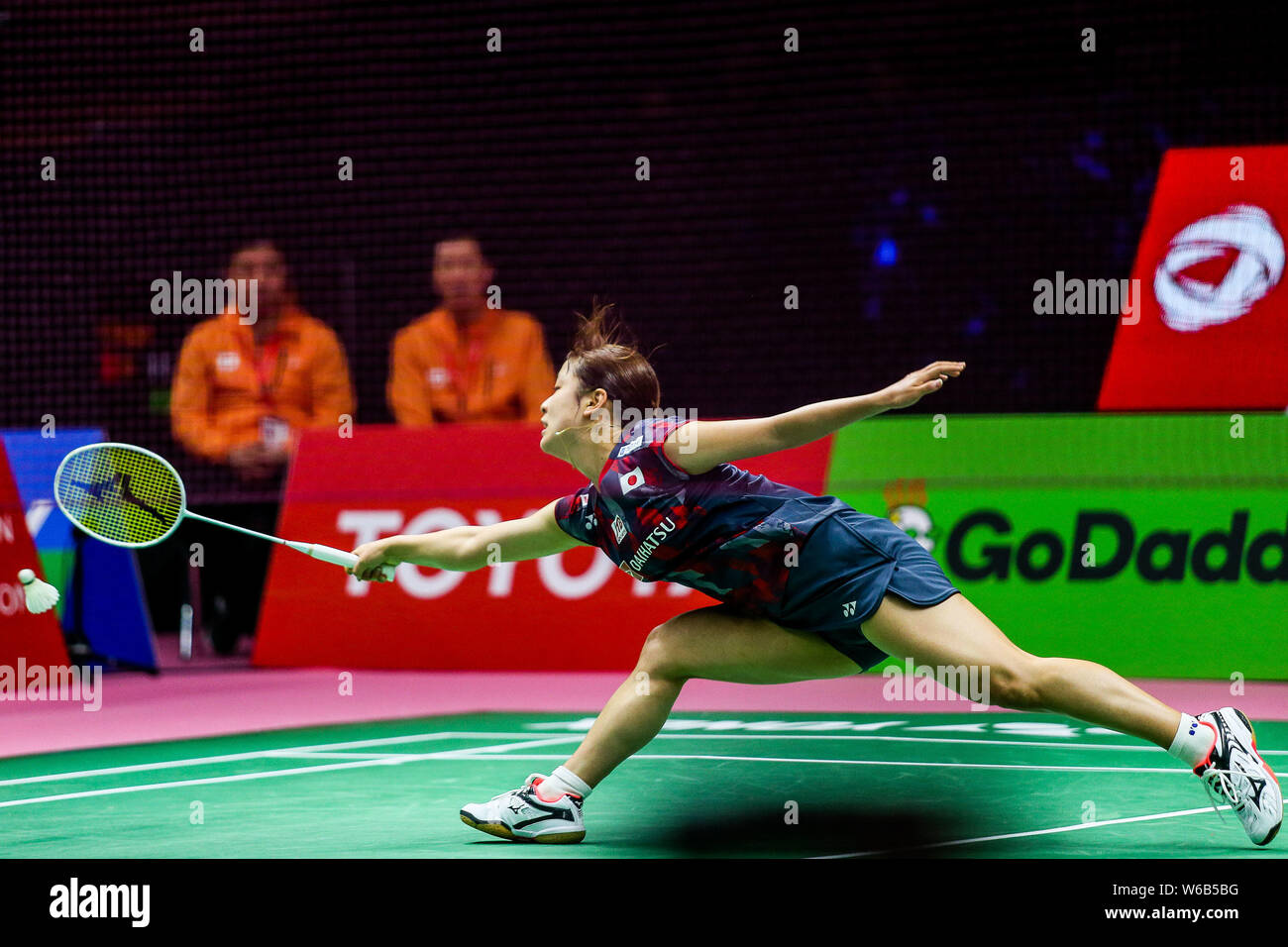 Nozomi Okuhara of Japan competes against Michelle Li of Canada in their womens singles of the Group A match during the TOTAL BWF Thomas and Uber Cup Fi Stock Photo