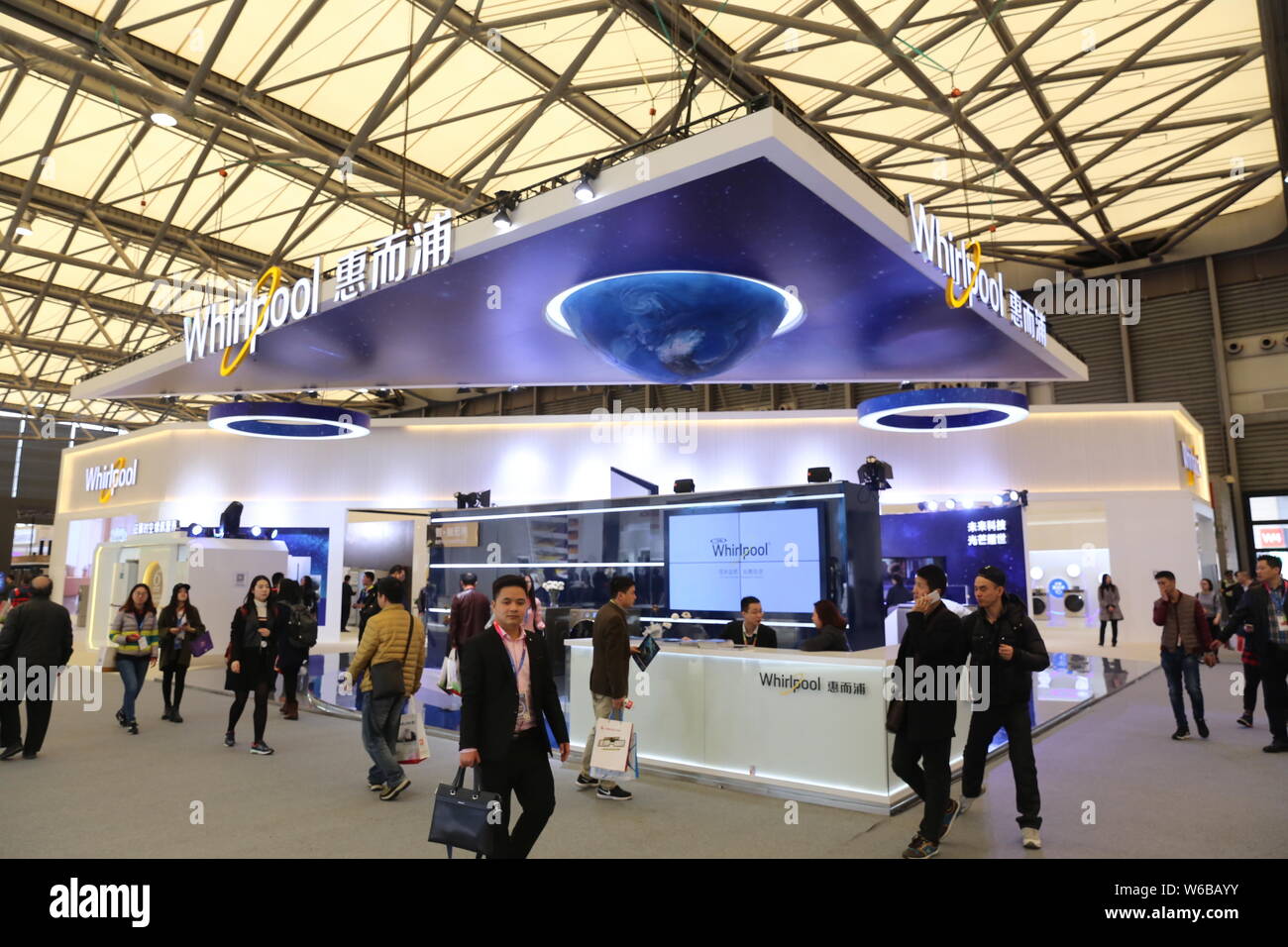 FILEPeople visit the stand of American home appliance manufacturer