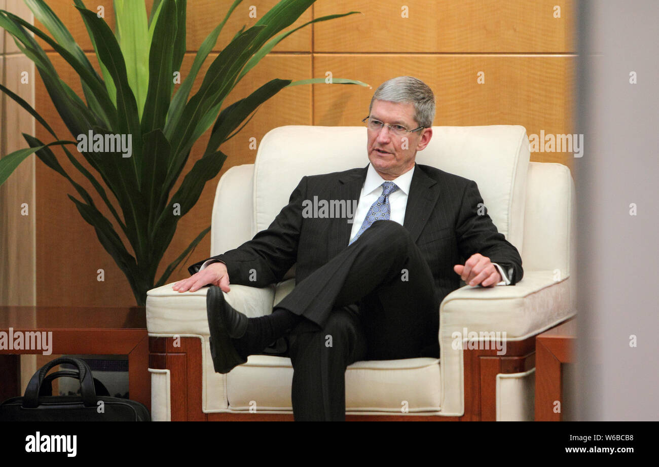 --FILE--Tim Cook, CEO of Apple Inc., attends a meeting at the Ministry of Commerce, in Beijing, China, 27 March 2012.   Apple Inc. Chief Executive Off Stock Photo