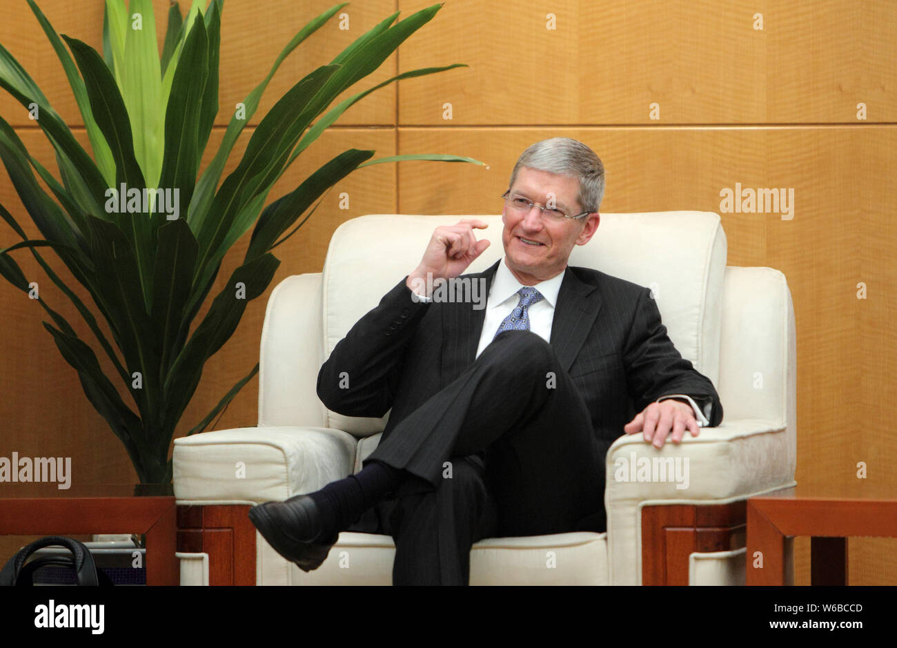 --FILE--Tim Cook, CEO of Apple Inc., attends a meeting at the Ministry of Commerce, in Beijing, China, 27 March 2012.   Apple Inc. Chief Executive Off Stock Photo