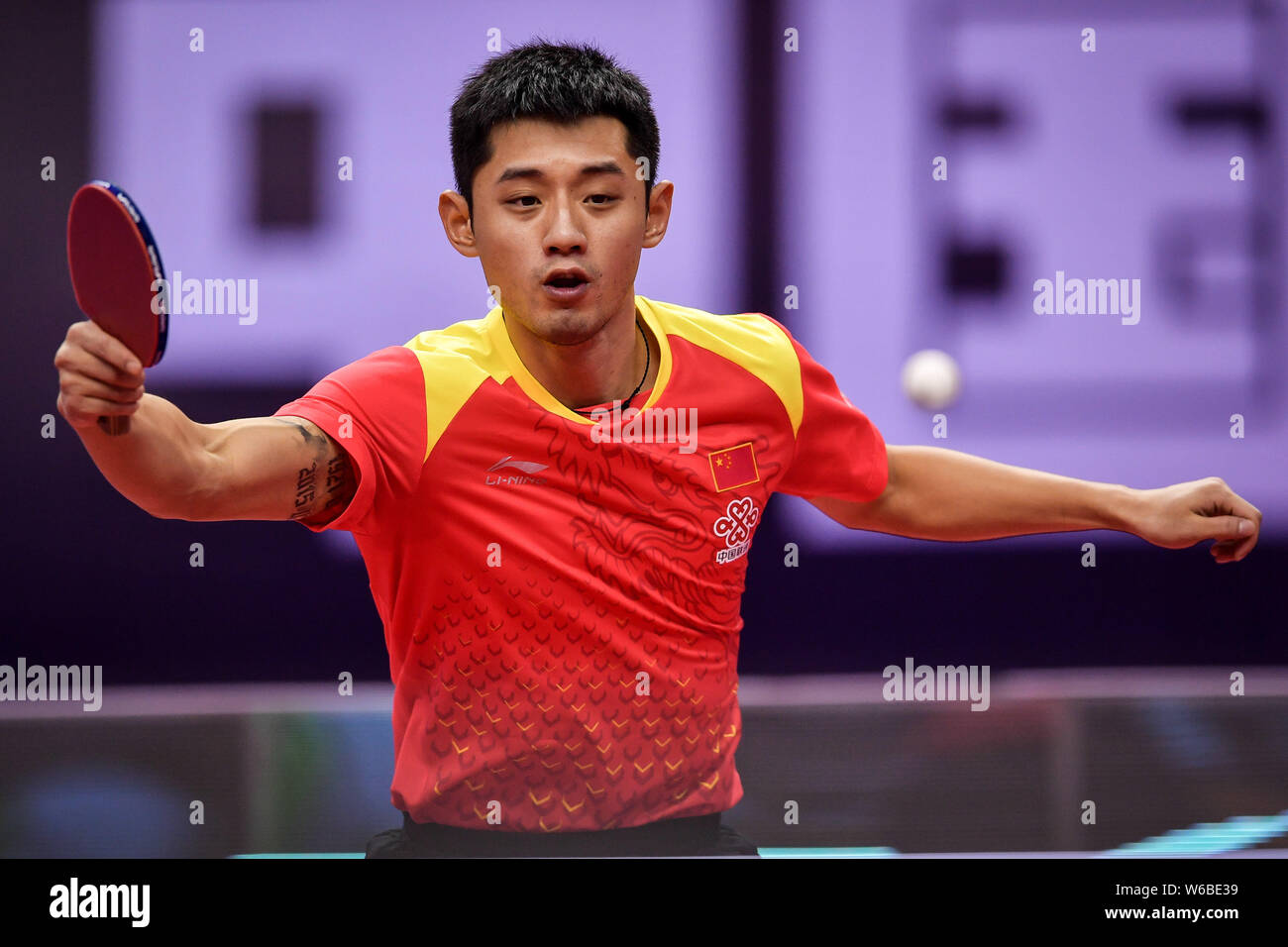 Zhang Jike of China returns a shot to Kim Min-hyeok of South Korea in their  men's singles preliminary round 2 match during the Seamaster 2018 ITTF Wor  Stock Photo - Alamy