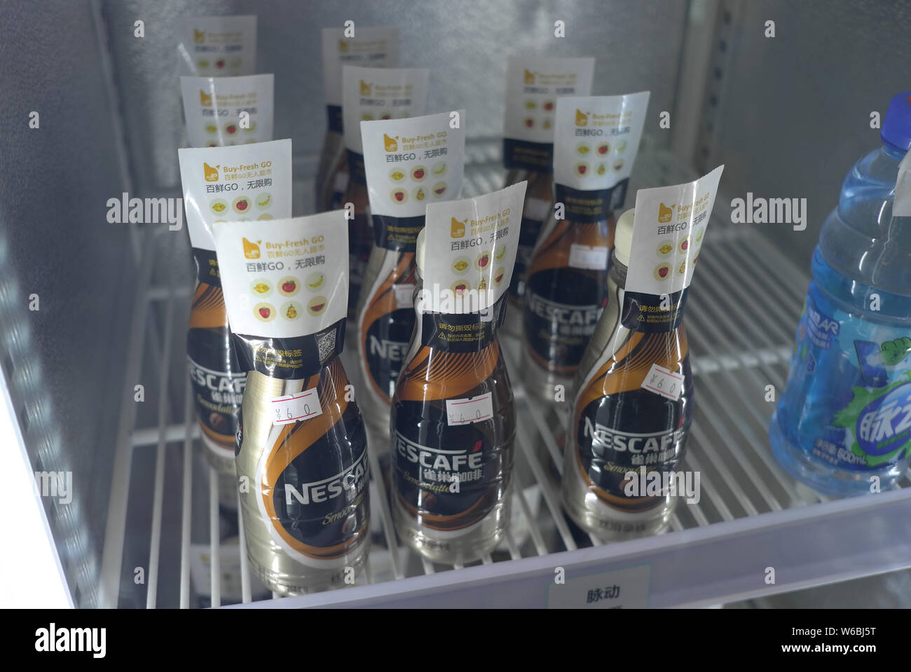 --FILE--Bottles of Nescafe instant coffee of Nestle are for sale at an ummanned store in Shenzhen city, south China's Guangdong province, 15 January 2 Stock Photo