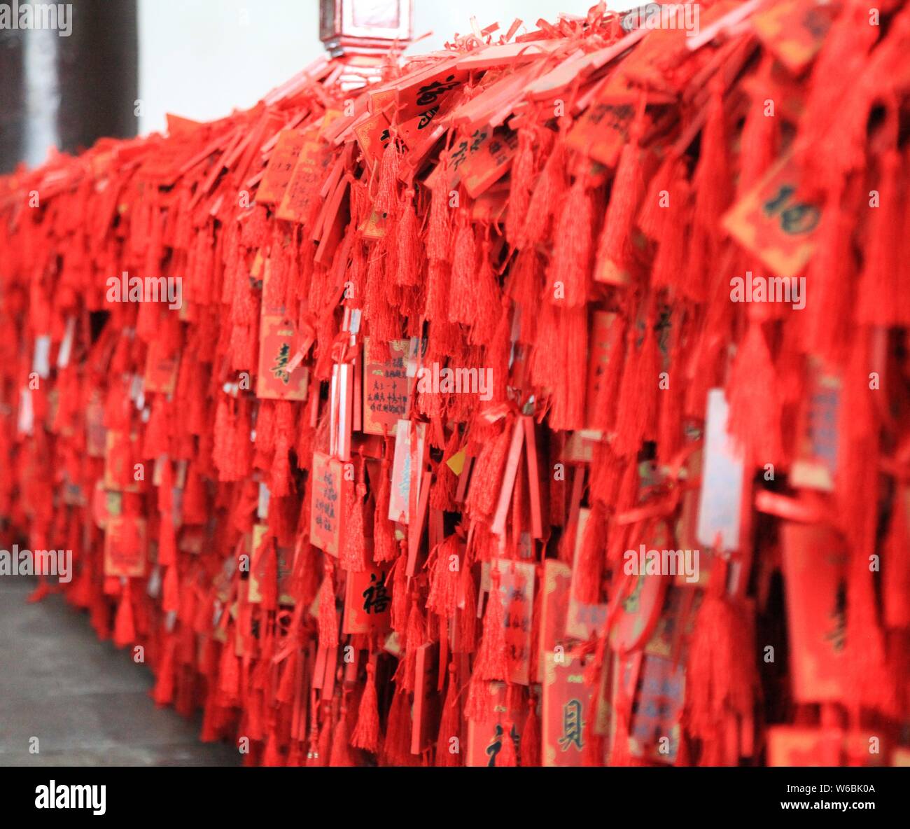 Blessings written by Chinese parents to prayer their children for good luck in the upcoming national college entrance exam, also known as gaokao, are Stock Photo