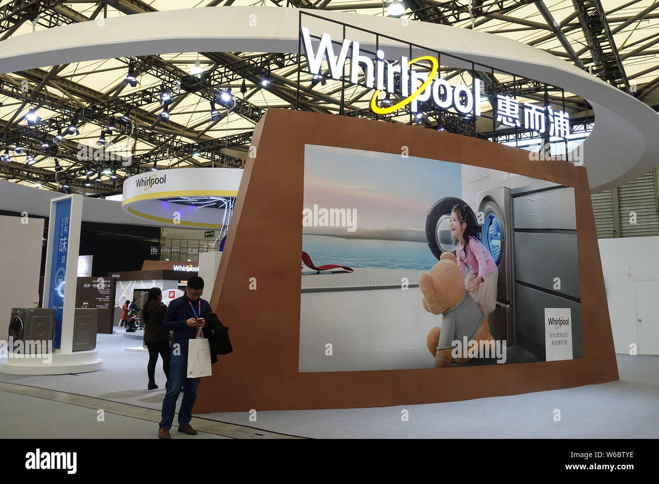 FILEPeople visit the stand of American home appliance manufacturer