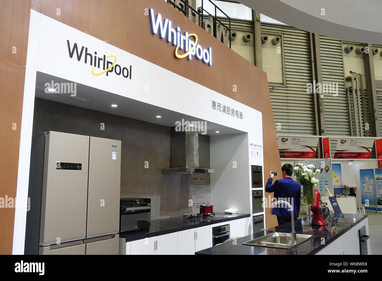 FILEA man visits the stand of American home appliance manufacturer