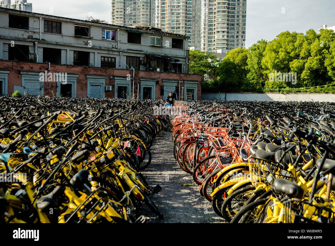 Abandoned bicycles of Chinese bikesharing services are piled up at a
