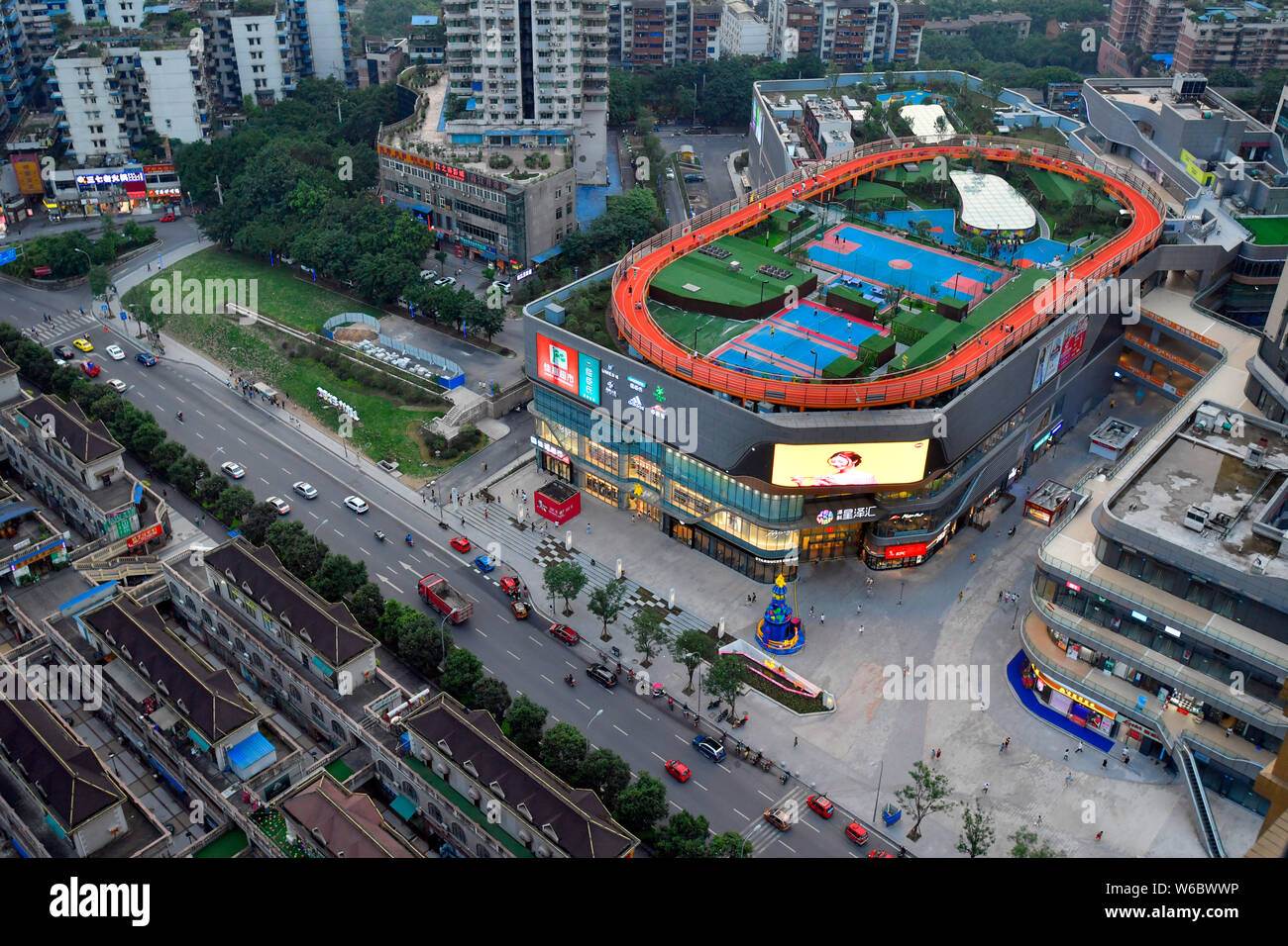 Aerial view of a stadium on the rooftop of a shopping mall in Chongqing, China, 22 May 2018.   A stadium on the roof of a shopping mall was pictured i Stock Photo