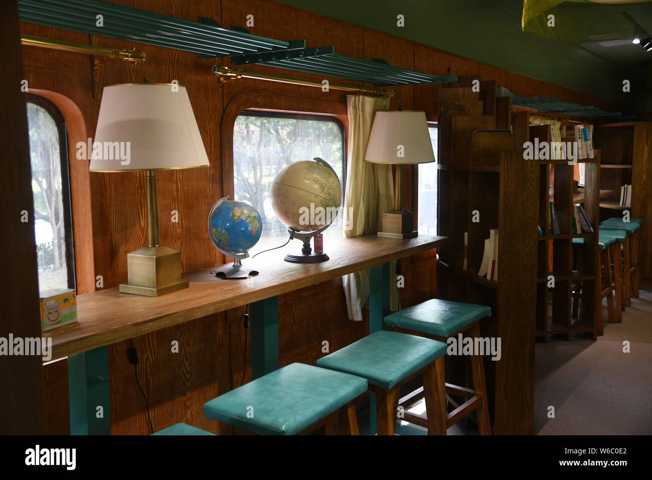 Interior View Of A Bookstore Transformed From Old Fashioned Green