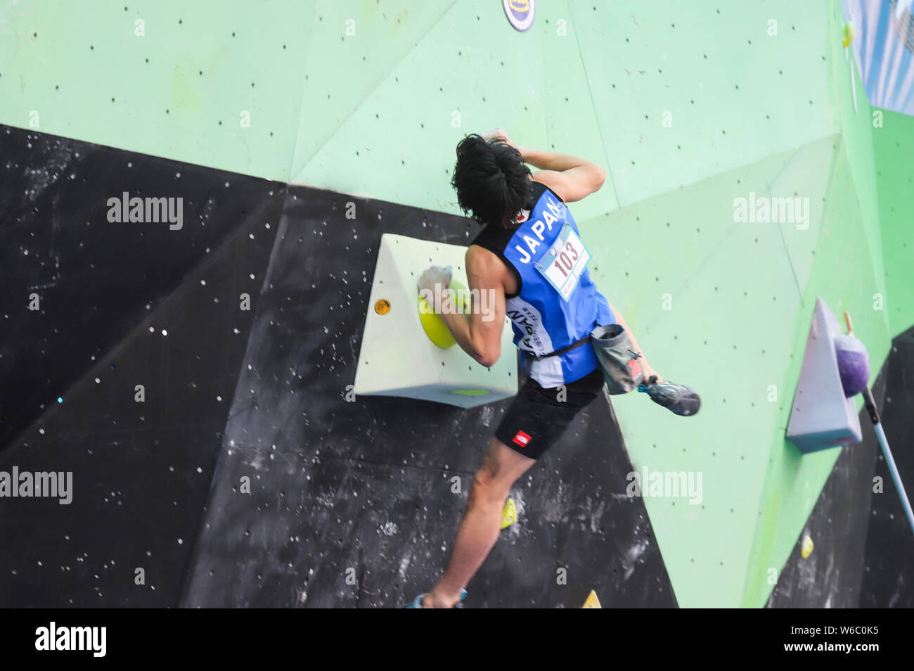 Yoshiyuki Ogata of Japan competes in the men bouldering qualification