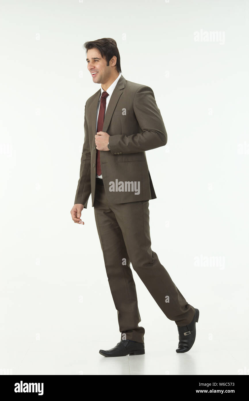 Walking man suit cut out hi-res stock photography and images - Alamy