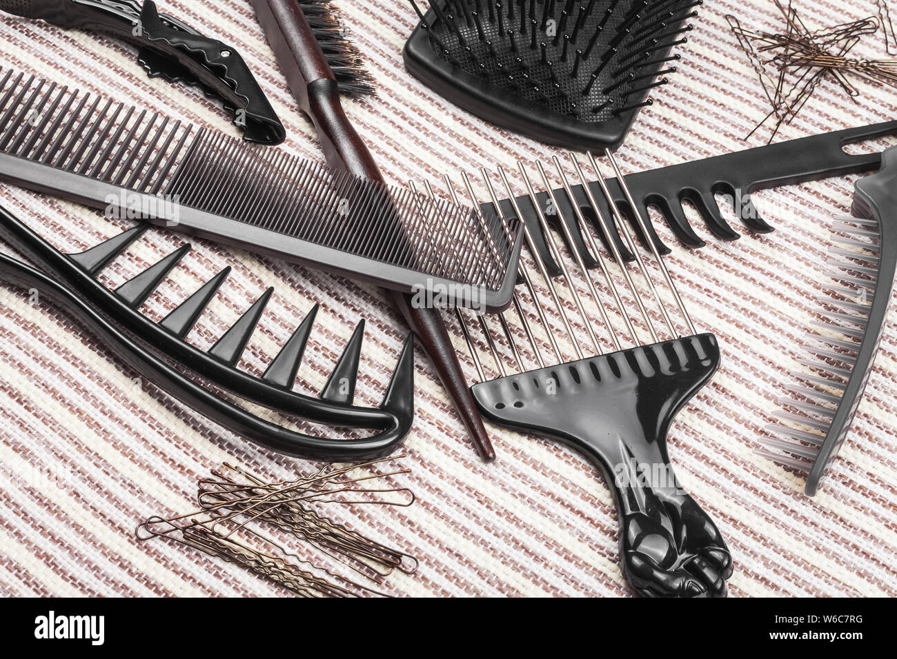 Set Of Different Hairbrushes Bobby Pins And Hair Sticks Stock