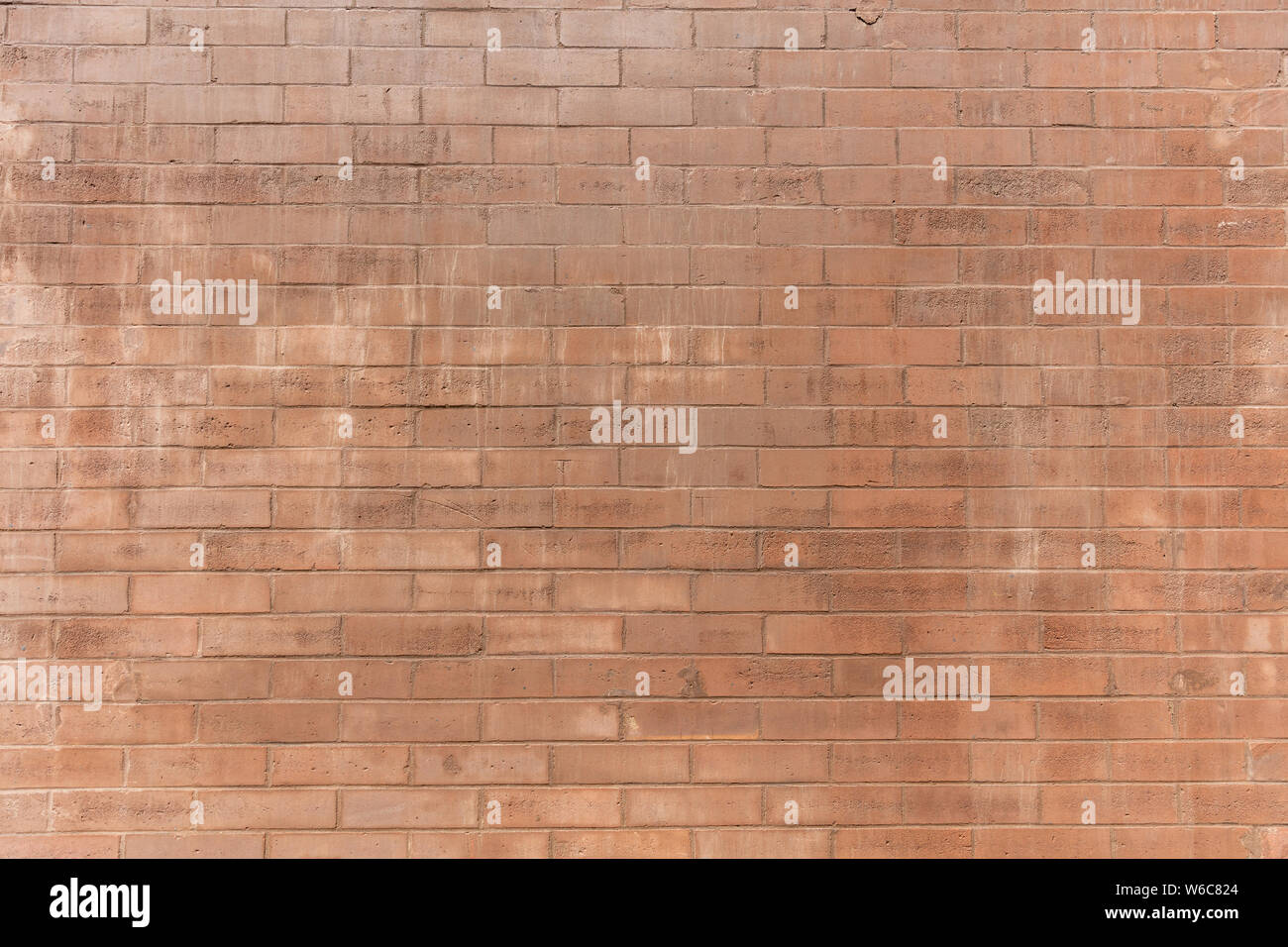 Brown color brick wall texture, full background. Traditional building facade Stock Photo
