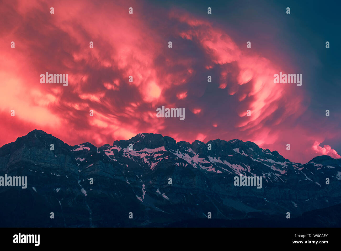 Spectacular sundown of the Dents du Midi mountain range in Switzerland Stock Photo