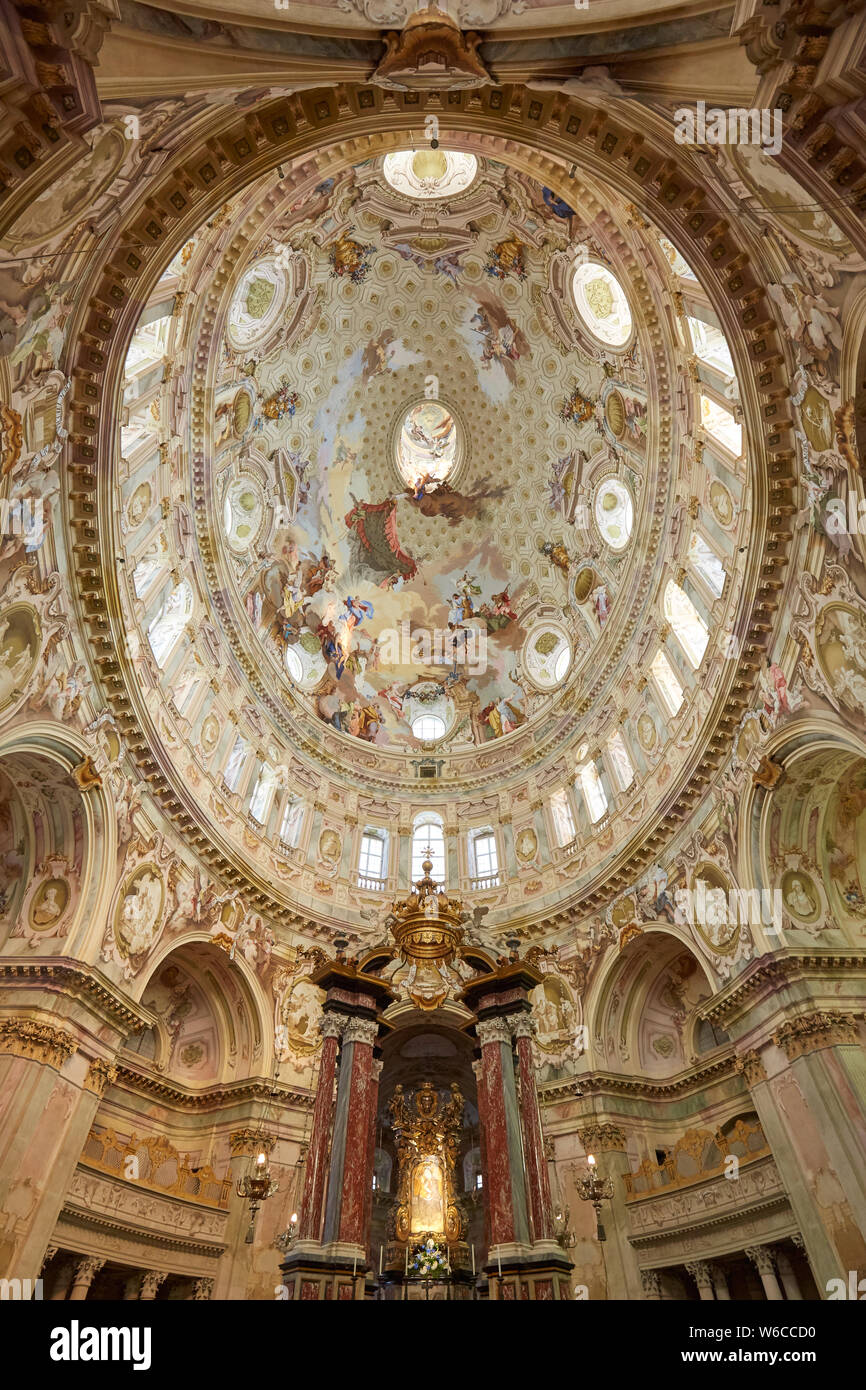 Vicoforte, Italy - August 17, 2016: Sanctuary of Vicoforte elliptical baroque dome with frescos and Holy Mary relic painting in Piedmont, Italy Stock Photo