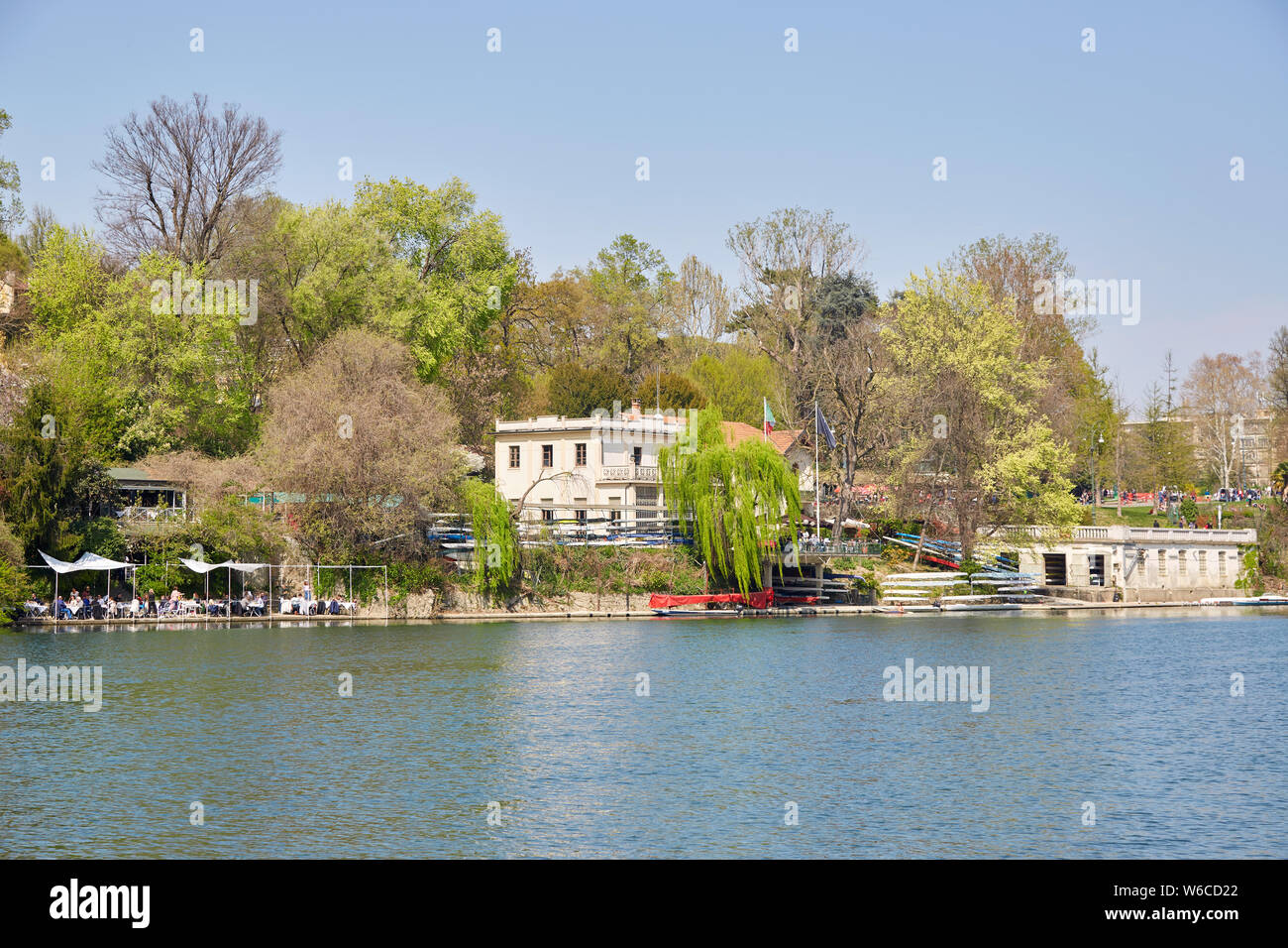 TURIN, ITALY - MARCH 31, 2019: Armida Rowing Club building and terrace with people, Po river in Piedmont, Turin, Italy. Stock Photo