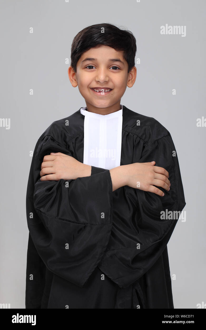 Boy pretending to be a lawyer and smiling Stock Photo Alamy