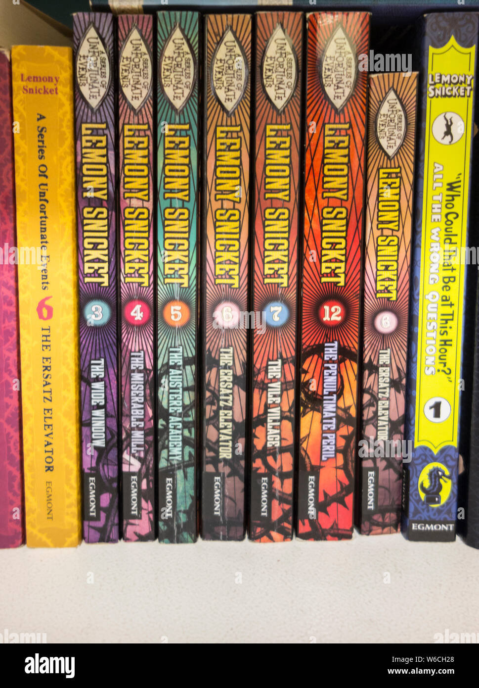 Colourful Lemony Snicket book spines and titles about the three Baudelaire orphans from Daniel Handler and Egmont Stock Photo
