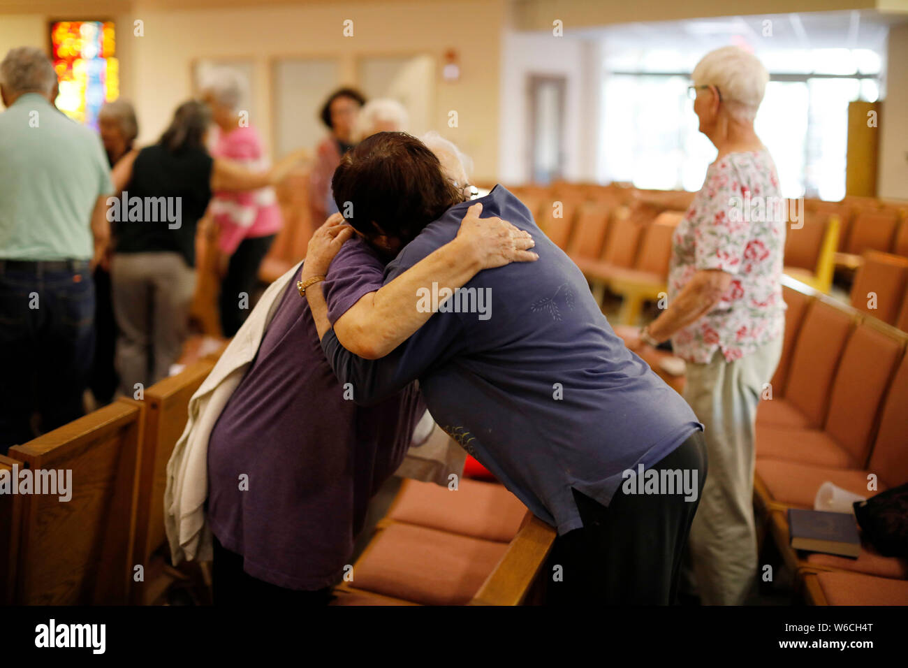 (190801) -- BEIJING, Aug. 1, 2019 (Xinhua) -- People hug each other as they mourn for the victims of a garlic festival shooting incident in San Jose, California, the United States, July 30, 2019. A six-year-old boy and a 13-year-old girl were among the three victims killed in a shooting at an annual garlic festival held in Gilroy city, Northern California, Gilroy Police Chief Scot Smithee said Monday. The police chief also updated the number of total injuries to 12 who survived the shooting at the annual Gilroy Garlic Festival. The injuries were previously put at 15 on Sunday. (Photo by Li Stock Photo