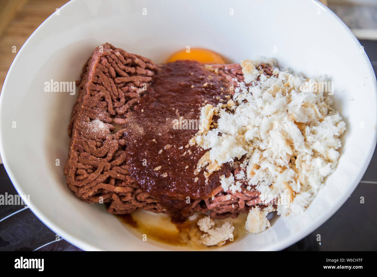 Making burger patties using vegan mince to test if different taste