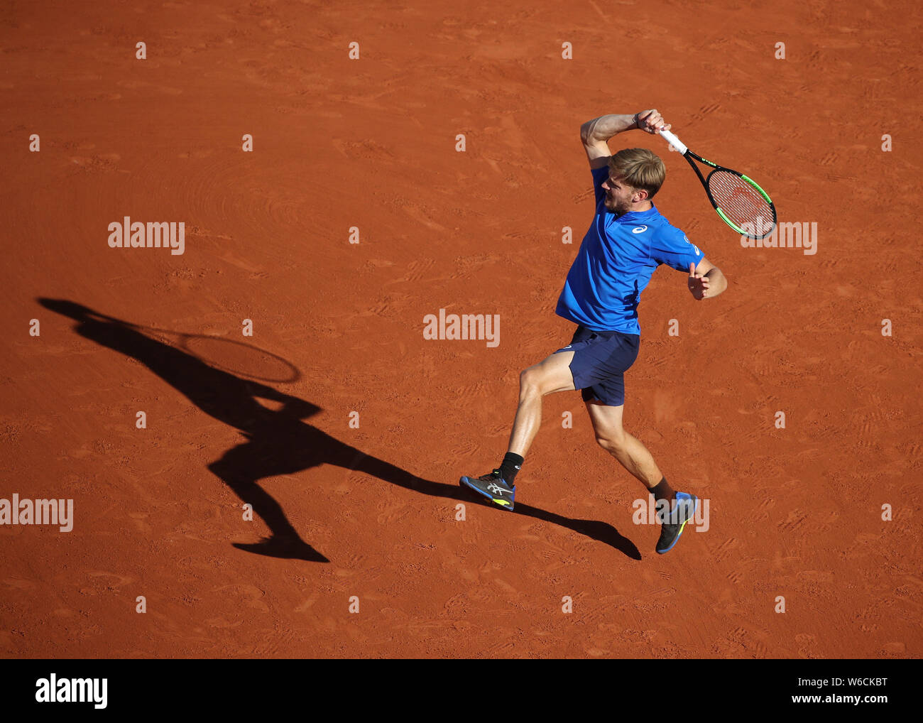 Belgian  tennis player David Goffin playing forehand shot in French Open 2019 tournament, Paris, France Stock Photo
