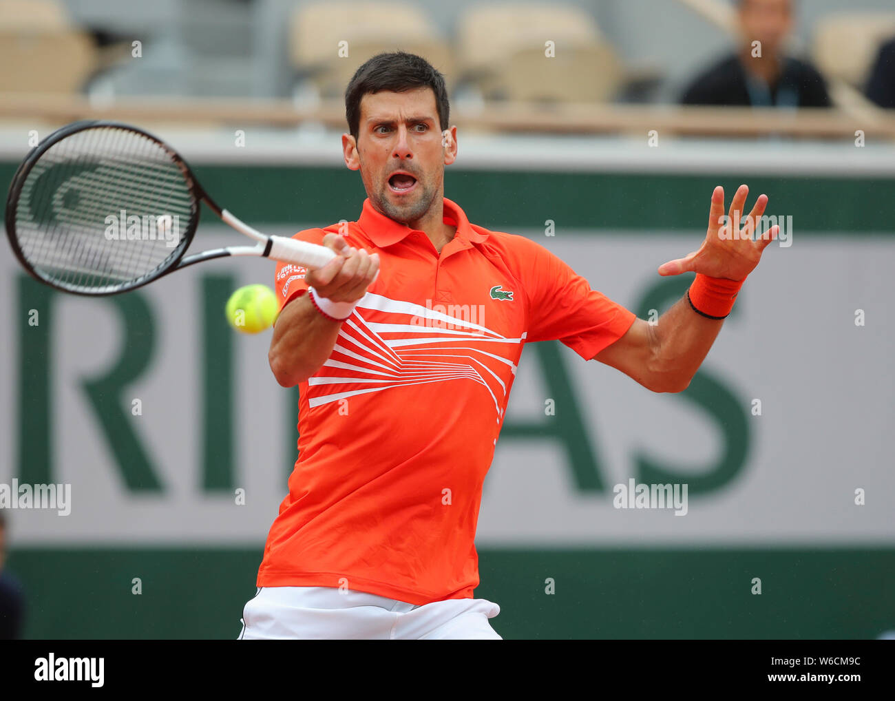 Serbian tennis player Novak Djokovic playing a forehand shot in French Open 2019  tennis tournament, Paris, France Stock Photo - Alamy