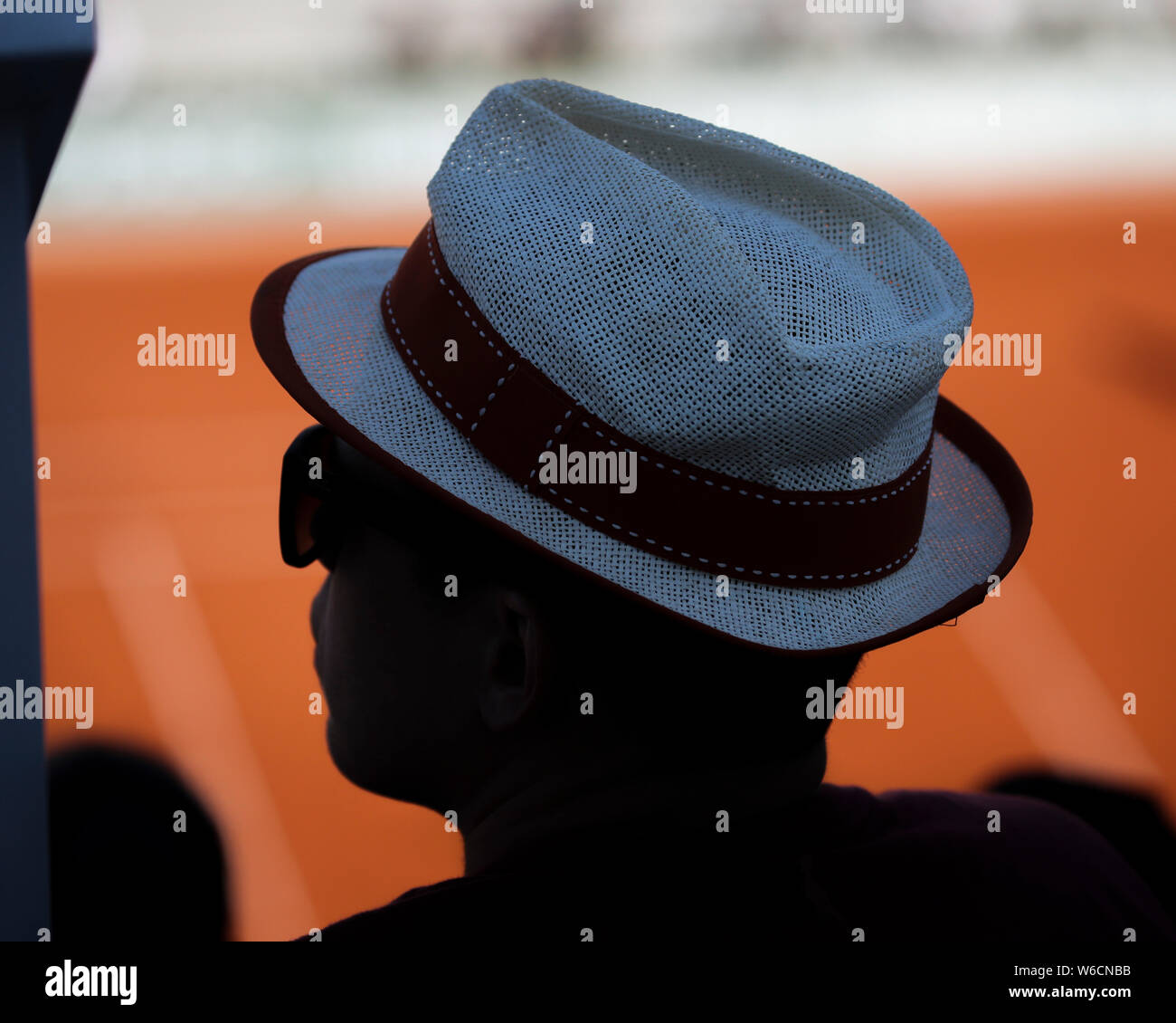 Close up of male spectator wearing a sun hat watching French Open 2019 tournament, Paris, France Stock Photo
