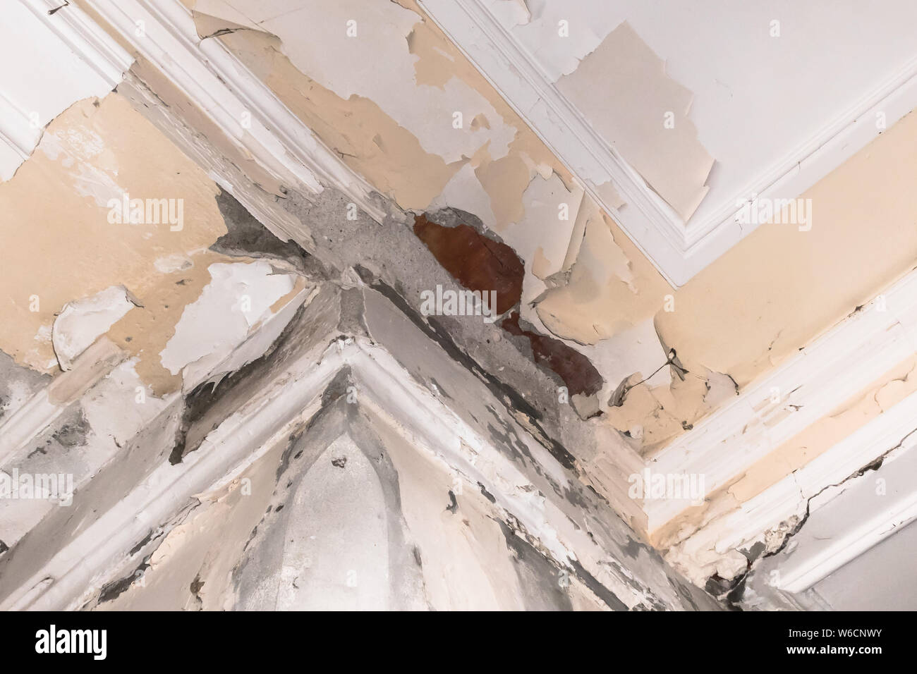 Peeling Paint On An Interior Ceiling A Result Of Humidity Stock