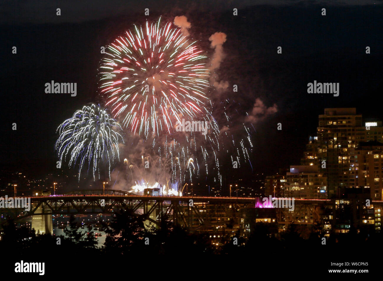 Vancouver, Canada. 31st July, 2019. Team Canada lights up the sky during the Celebration of Light at English Bay in Vancouver, Canada, July 31, 2019. Team Canada lighted up the night sky with fireworks as part of the annual Honda Celebration of Light, which attracted hundred of thousands people to attend. (Photo by Liang Sen/Xinhua) Credit: Xinhua/Alamy Live News Stock Photo