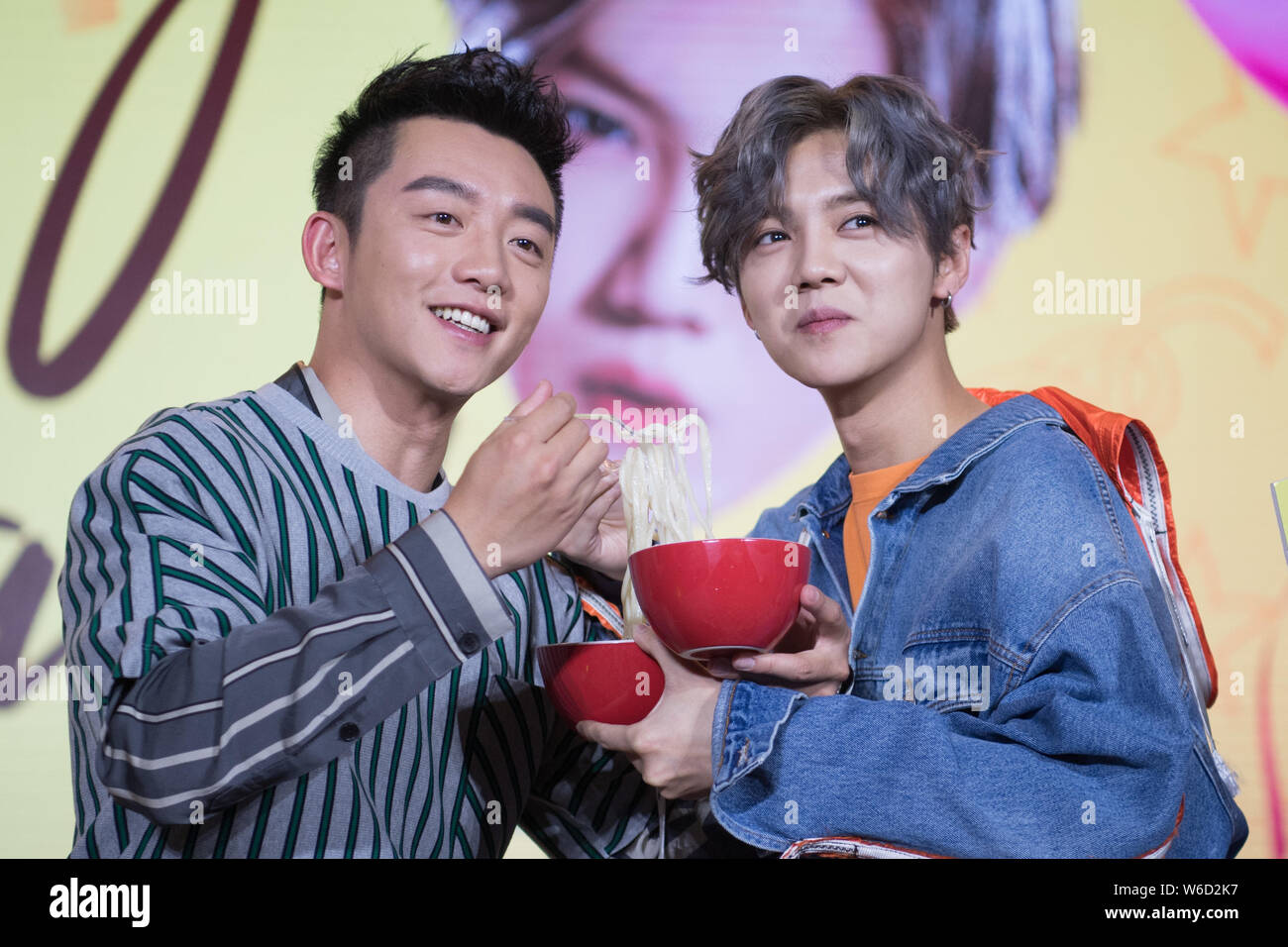 Chinese actor Ryan Zheng Kai, left, and Chinese actor and singer Lu Han attend a press conference for 'Keep Running Season 6' in Taiyuan city, north C Stock Photo