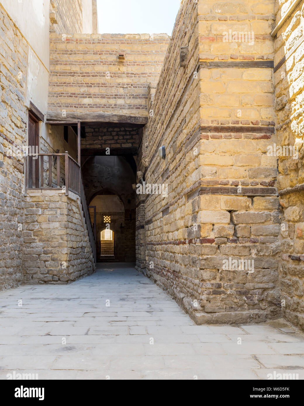 Exterior daylight shot of old abandoned stone bricks passage surrounding Sultan Qalawun Complex located in Al Moez Street, Cairo, Egypt Stock Photo