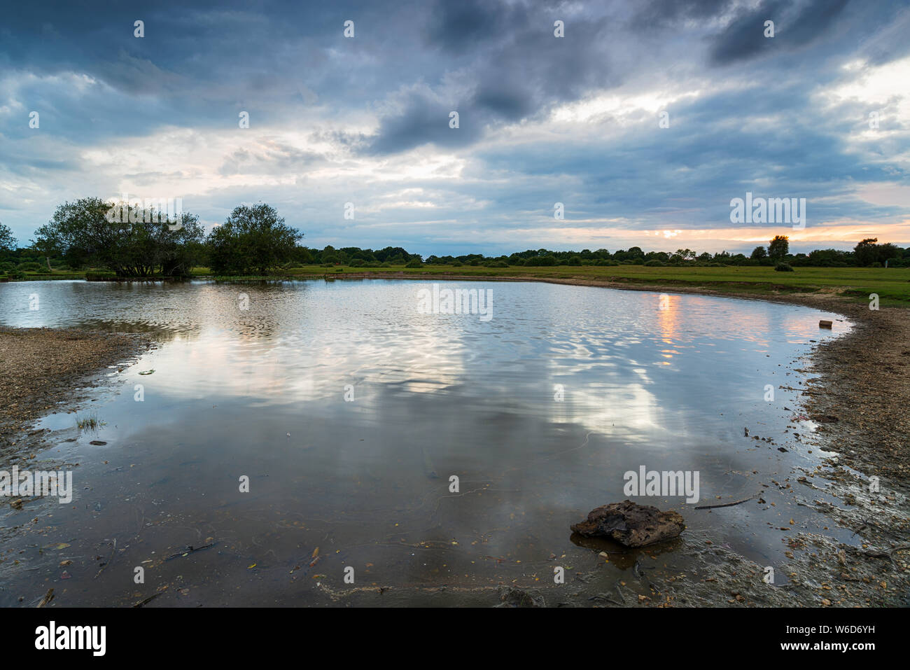 Moody sky over Janesmoor Pond near Fritham in the New Forest National Park in Hampshire Stock Photo