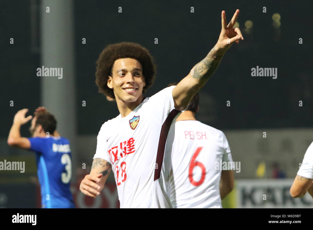 Belgian football player Axel Witsel of China's Tianjin Quanjian FC poses to celebrate after defeating Hong Kong's Kitchee SC in a Group E match during Stock Photo