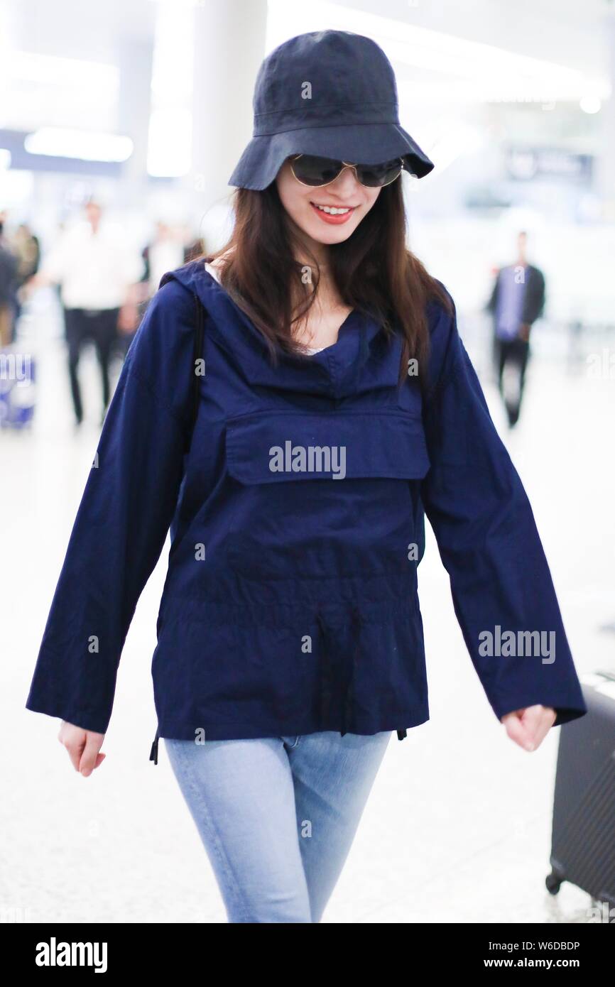 Chinese actress Ni Ni is pictured at the Shanghai Hongqiao International Airport in Shanghai, China, 11 April 2018. Stock Photo