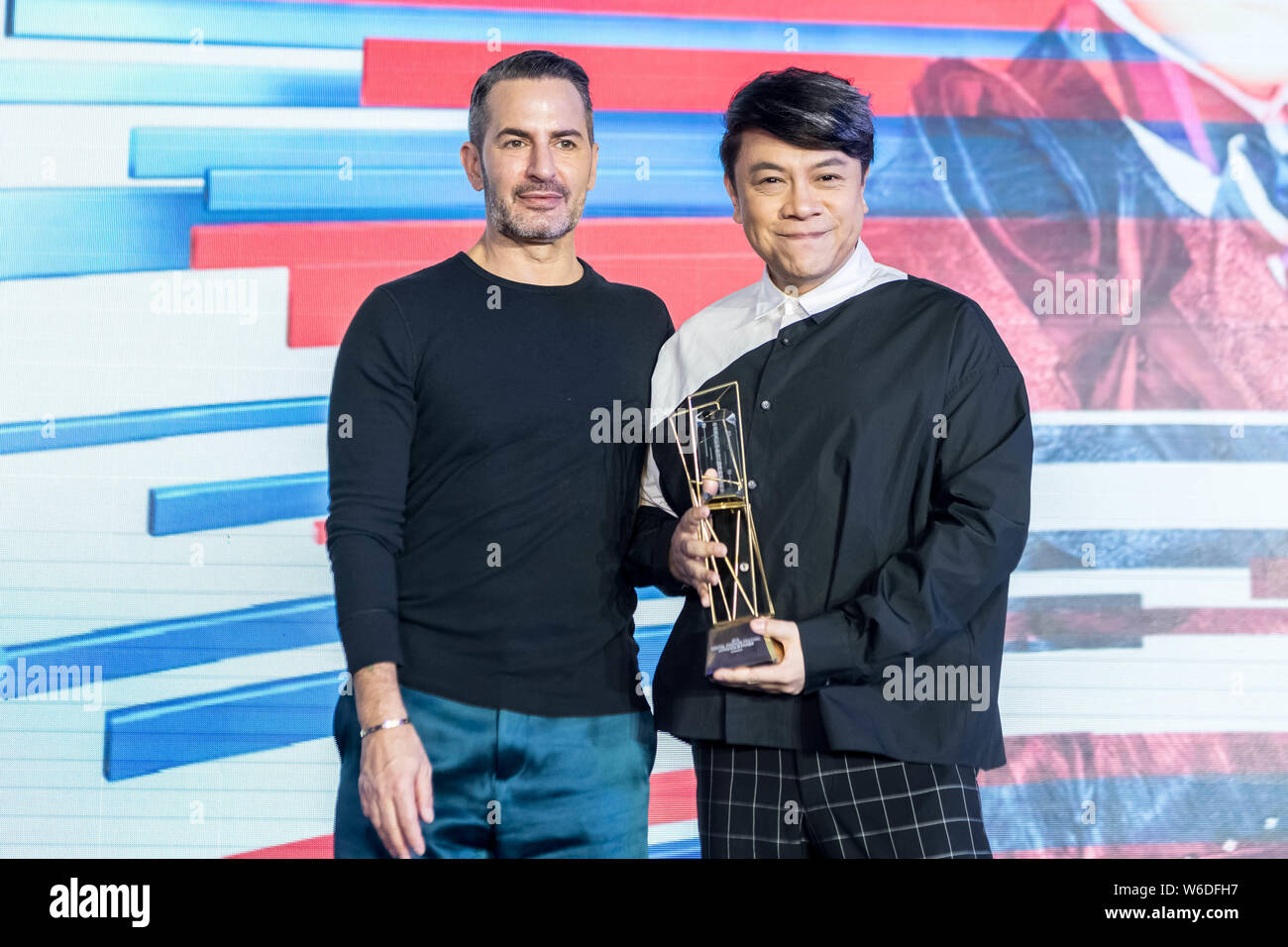 American fashion designer Marc Jacobs, left, and Taiwanese host