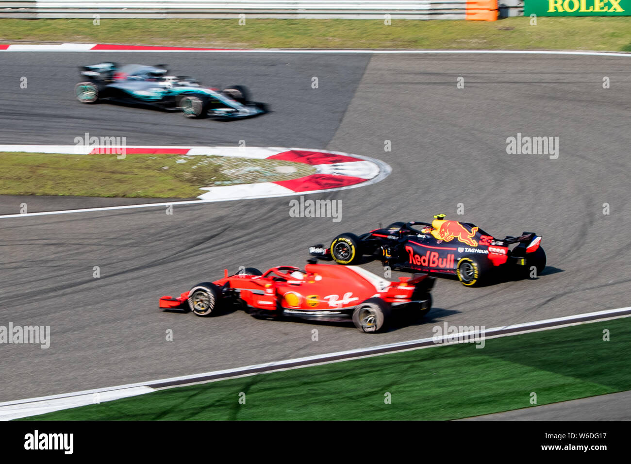 German F1 Sebastian Vettel Of Ferrari And Dutch F1 Driver Max Verstappen Of Red Bull Racing Collide As They Compete During The 18 Formula One Chines Stock Photo Alamy