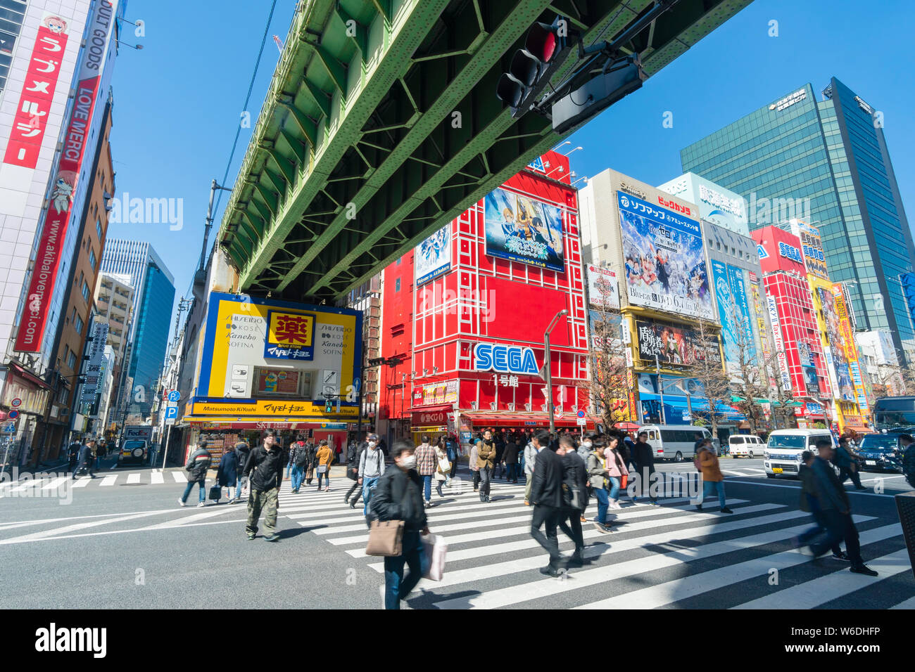 Tokyo, Japan - Mar 18, 2019: People visiting Akihabara in Tokyo. It is a shopping district for video games, anime, comics and computer goods. Stock Photo