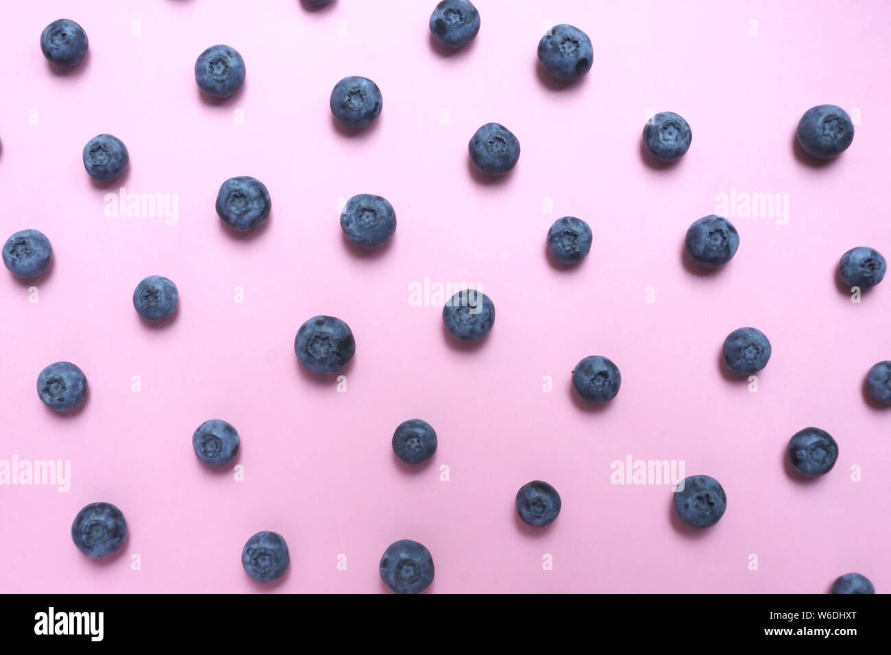 Blueberry pattern on pink background top view Stock Photo