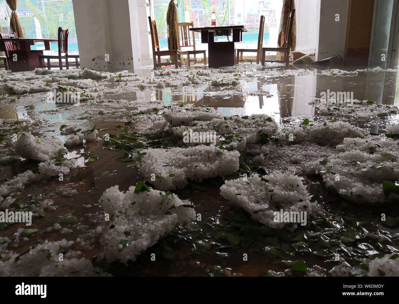 Interior view of a residential building after a heavy hailstorm in Bijie city, southwest China's Guizhou province, 21 April 2018. Stock Photo