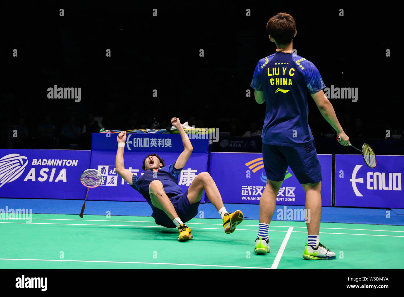 Li Junhui, left, and Liu Yuchen of China celebrate after defeating ...