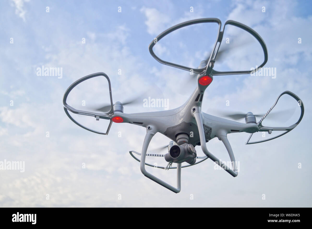 FILE--An unmanned aerial vehicle (UAV), or drone, of DJI (Dajiang  Innovations), flies in Suzhou city, east China's Jiangsu province, 11 May  2017 Stock Photo - Alamy