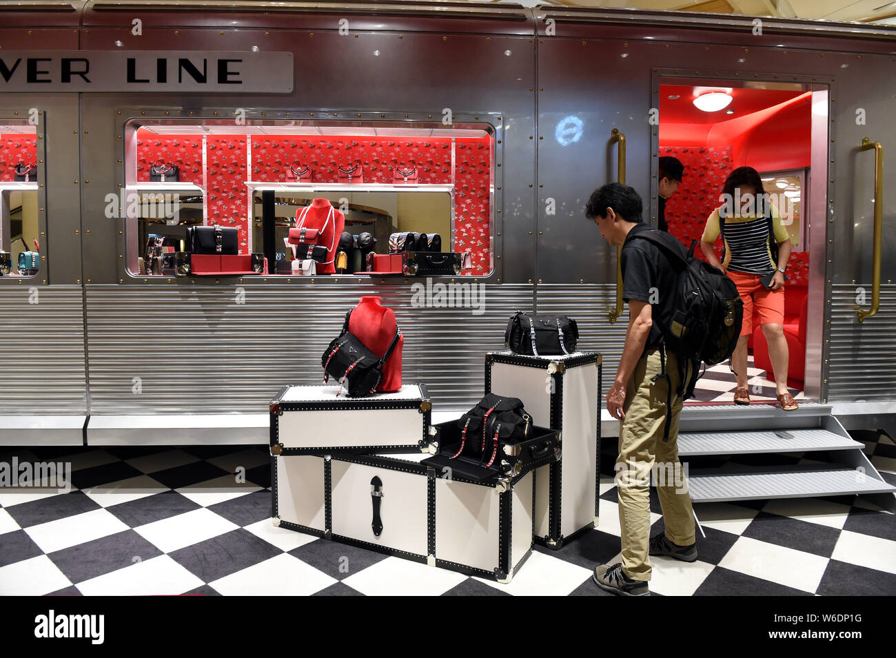View of the pop-up rail themed Prada boutique, Prada Silver Line, at  Pacific Place in Hong Kong, China, 27 April 2018. Adopting a rail theme,  Prad Stock Photo - Alamy