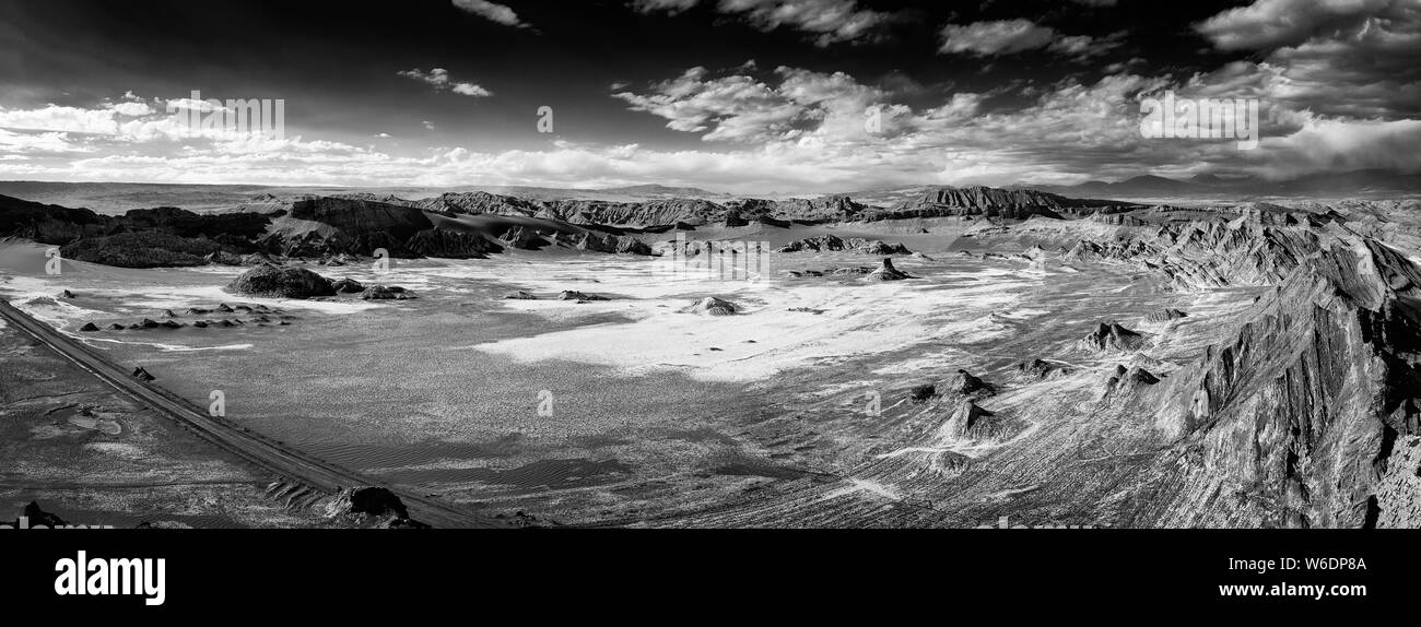 Extreme territory in  Valley of the moon. Atacama desert. Chile. South America. The photo does not contain noise. It is clay dust, salt and sand. Blac Stock Photo