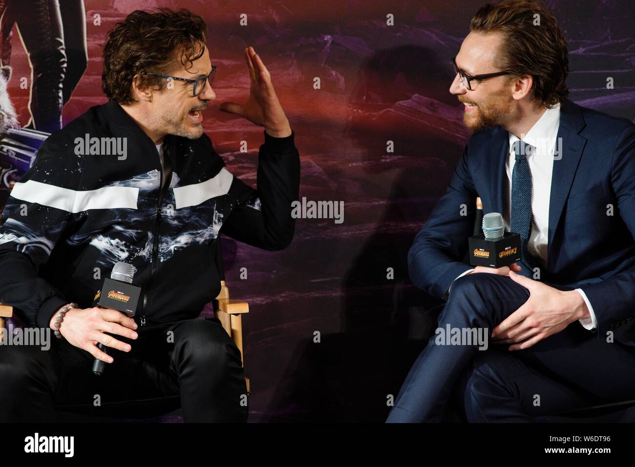 American actor and singer Robert Downey Jr., left, and English actor Tom  Hiddleston attend a press conference for new movie "Avengers: Infinity War"  i Stock Photo - Alamy