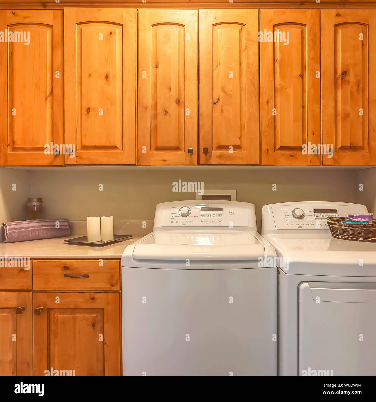 Frame Laundry Room Interior With Washer Dryer And Counter Against