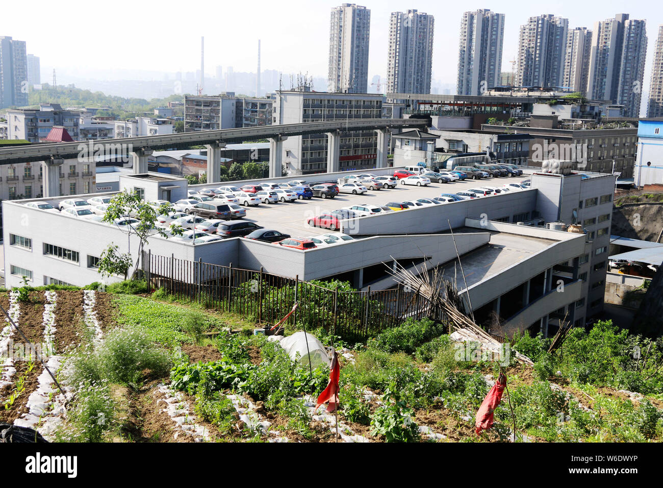 Vehicles are lined up on an 8storey rooftop parking lot in Chongqing