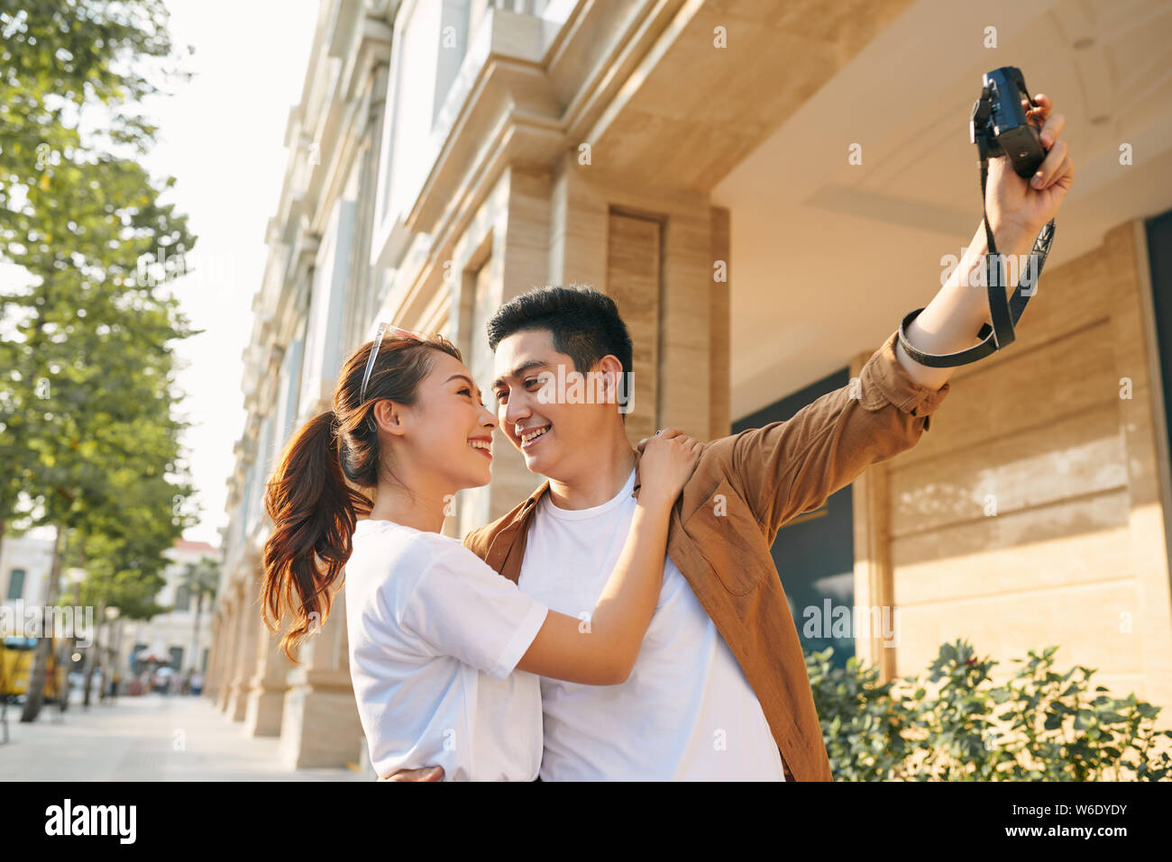 Happy tourists taking photo of themselves Stock Photo