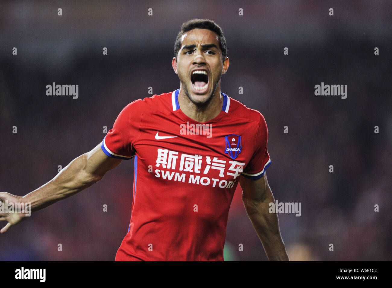 Brazilian football player Alan Kardec of Chongqing SWM celebrates after ...