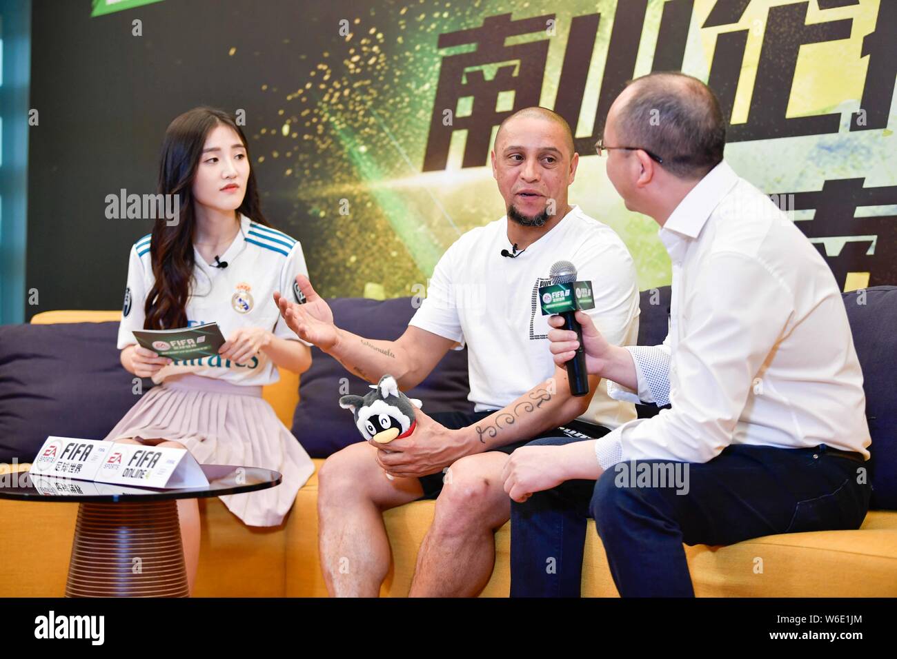 Former Brazilian football player Roberto Carlos plays the interactive question and answer during his China tour 2018 event at the Tencent Kexing Scien Stock Photo